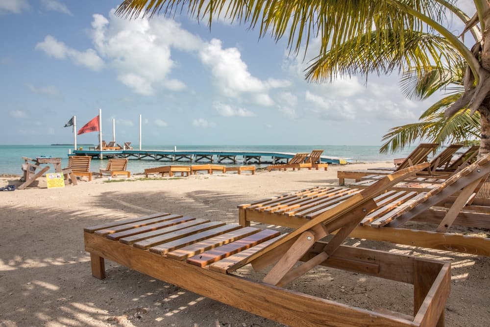 Chairs lined up on Secret Beach in Belize