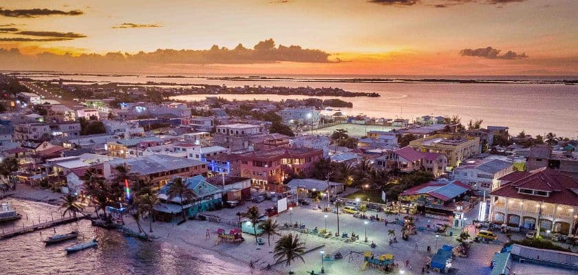 Aerial sunset view over San Pedro Town on Ambergris Caye at dusk
