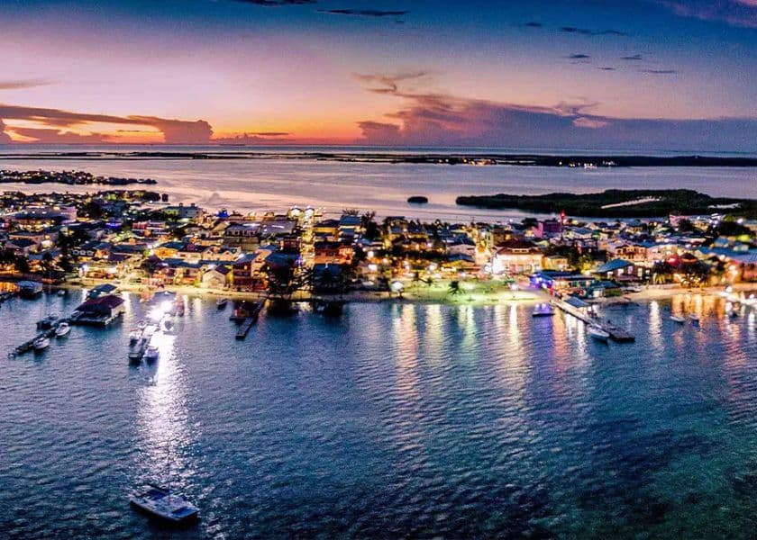 aerial view of san pedro waterfront at dusk with town lights glowing aerial view of san pedro waterfront at dusk with town lights glowing