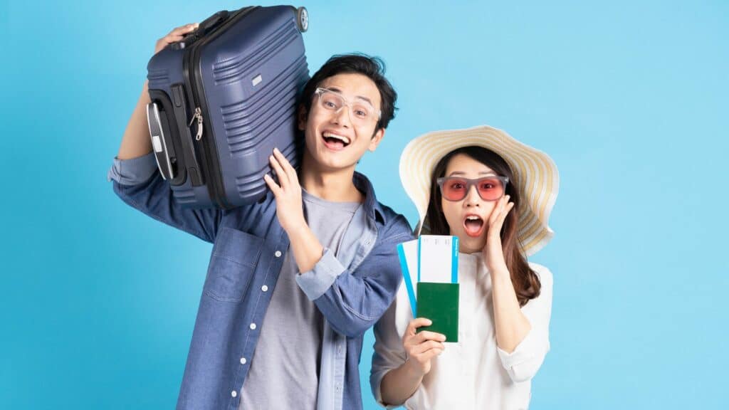 young asian couple traveling together